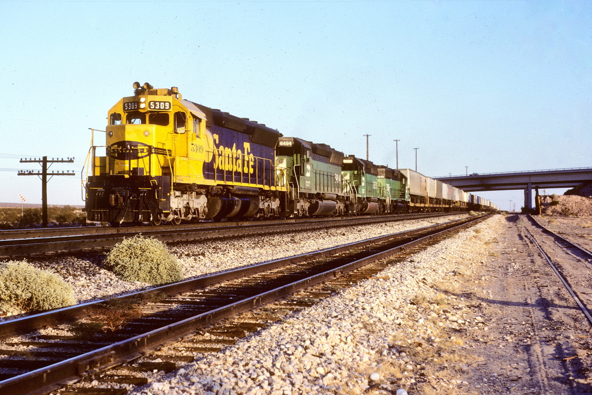 SF 5309 is a class EMD SD45 and  is pictured in Pisgah, California, USA.  This was taken along the Needles/SF on the Santa Fe. Photo Copyright: Rick Doughty uploaded to Railroad Gallery on 09/17/2024. This photograph of SF 5309 was taken on Saturday, September 07, 1985. All Rights Reserved. 