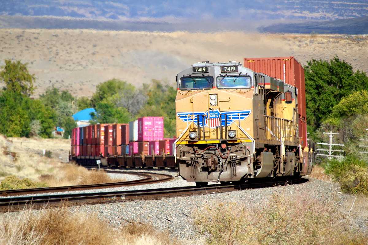 UP 7419 is a class GE ES44AC and  is pictured in King Hill, Idaho, USA.  This was taken along the Nampa/UP on the Union Pacific Railroad. Photo Copyright: Rick Doughty uploaded to Railroad Gallery on 09/28/2024. This photograph of UP 7419 was taken on Sunday, October 17, 2021. All Rights Reserved. 