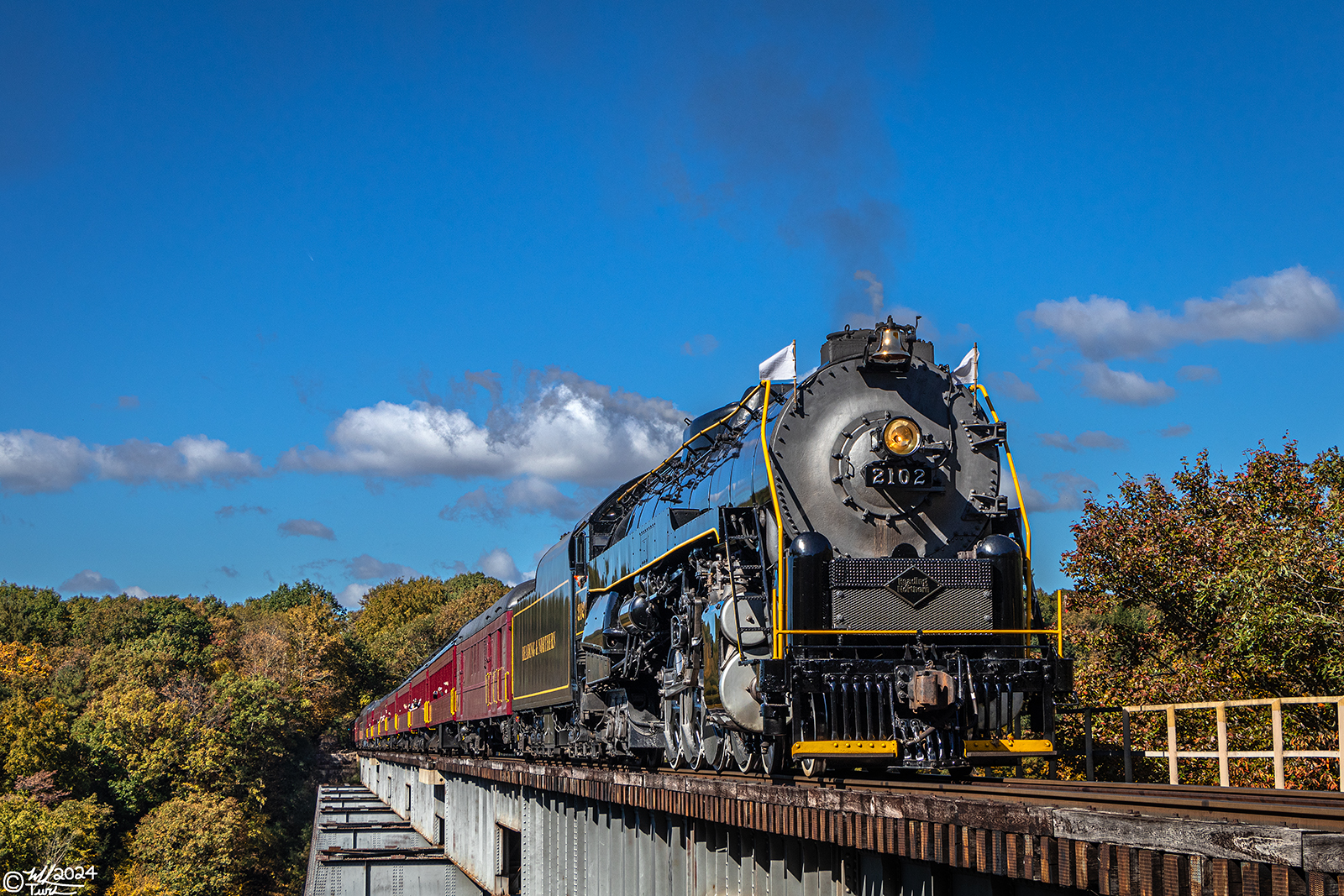 RDG 2102 is a class T-1 and  is pictured in Hometown, Pennsylvania, USA.  This was taken along the Hometown High Bridge on the Reading Company. Photo Copyright: Mark Turkovich uploaded to Railroad Gallery on 10/09/2024. This photograph of RDG 2102 was taken on Saturday, October 05, 2024. All Rights Reserved. 