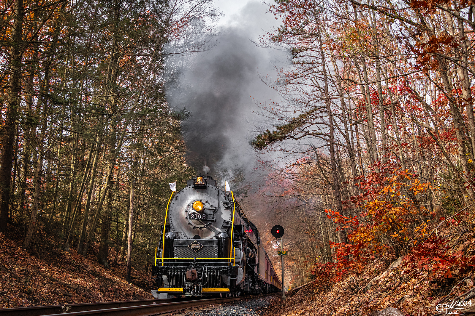 RDG 2102 is a class T-1 and  is pictured in Hometown, Pennsylvania, USA.  This was taken along the Milepost 108 on the Reading Company. Photo Copyright: Mark Turkovich uploaded to Railroad Gallery on 10/29/2024. This photograph of RDG 2102 was taken on Saturday, October 26, 2024. All Rights Reserved. 