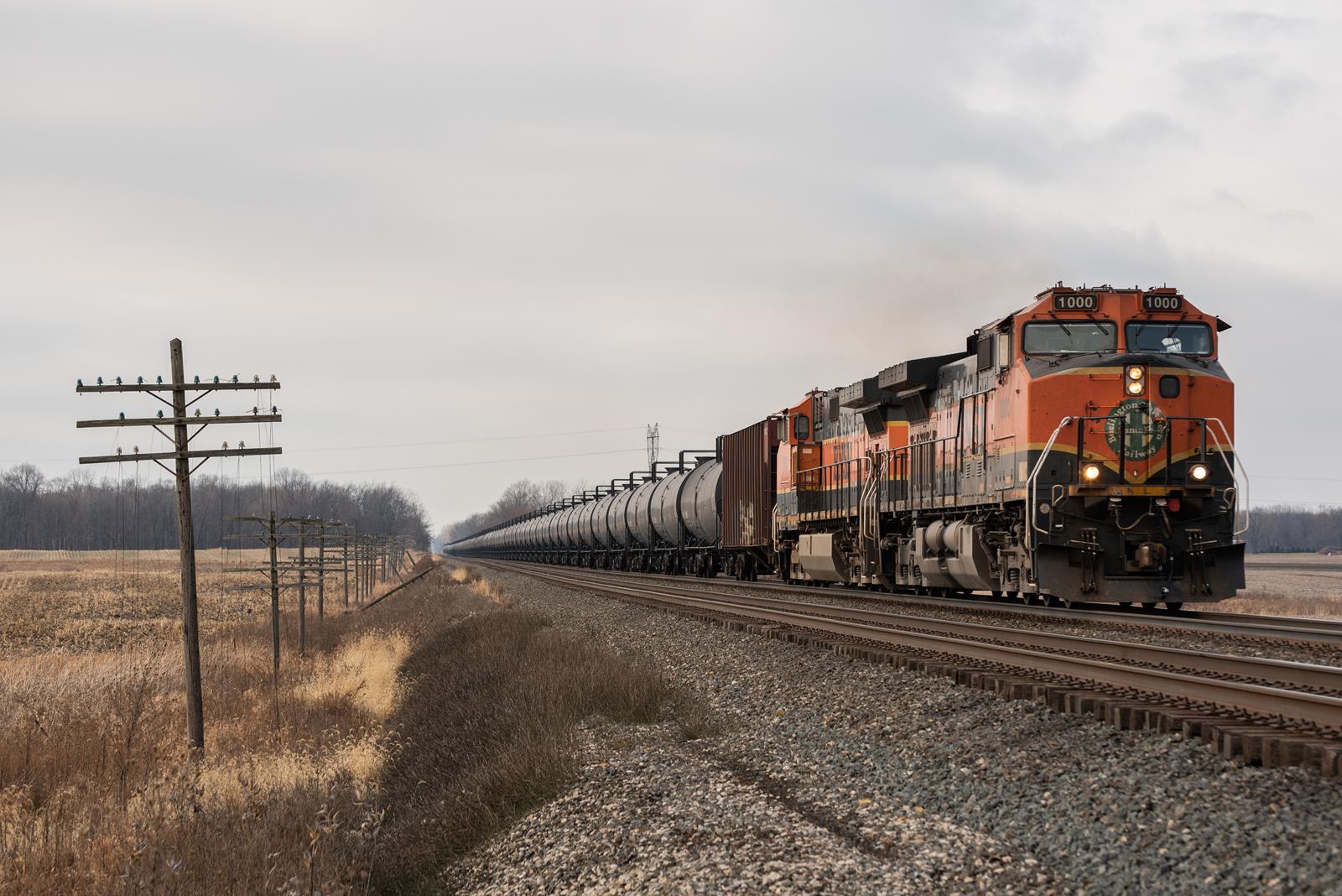 BNSF 1000 is a class GE C44-9W (Dash 9-44CW) and  is pictured in Wawaka, Indiana, USA.  This was taken along the Chicago Line on the Norfolk Southern Railway. Photo Copyright: Spencer Harman uploaded to Railroad Gallery on 12/13/2022. This photograph of BNSF 1000 was taken on Tuesday, December 13, 2022. All Rights Reserved. 