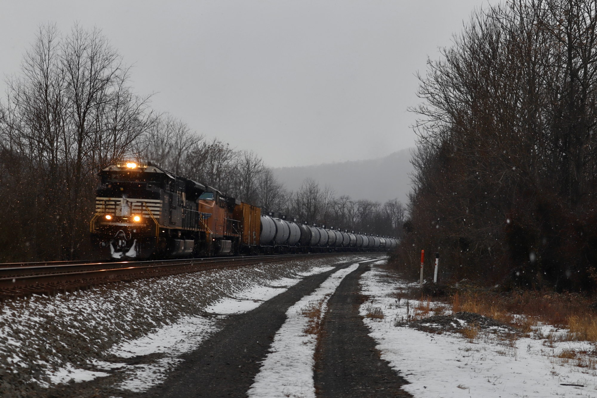 NS 7297 is a class EMD SD70ACU and  is pictured in Mill Creek , Pennsylvania, USA.  This was taken along the NS Pittsburgh line on the Norfolk Southern Railway. Photo Copyright: Robby Lefkowitz uploaded to Railroad Gallery on 12/22/2022. This photograph of NS 7297 was taken on Saturday, December 17, 2022. All Rights Reserved. 