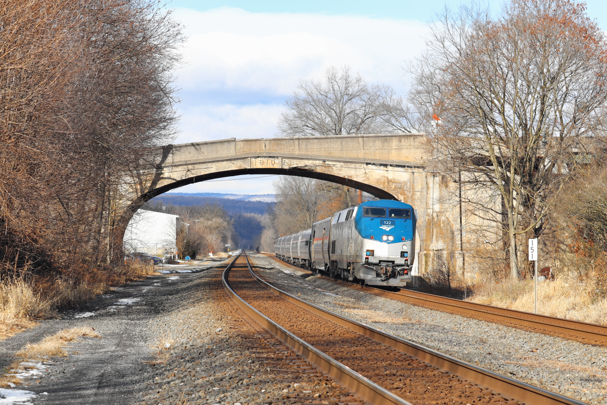 AMTK 122 is a class GE P42DC and  is pictured in Port Royal, Pennsylvania, USA.  This was taken along the NS Pittsburgh line on the Norfolk Southern. Photo Copyright: Robby Lefkowitz uploaded to Railroad Gallery on 12/22/2022. This photograph of AMTK 122 was taken on Sunday, December 18, 2022. All Rights Reserved. 