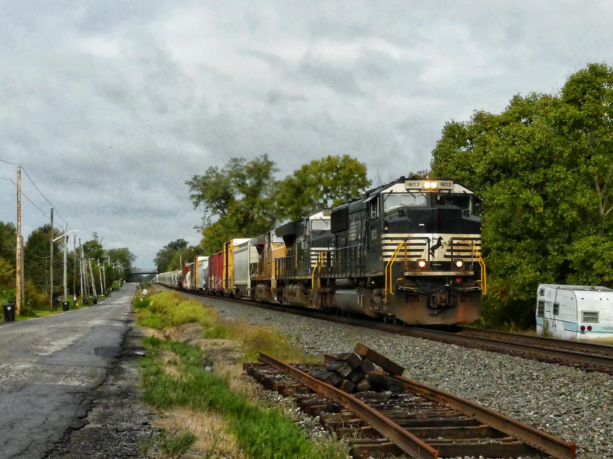 NS 1803 is a class EMD SD70ACC and  is pictured in Alden, New York , USA.  This was taken along the Southern Tier  on the Norfolk Southern. Photo Copyright: Scott  Murnan  uploaded to Railroad Gallery on 12/23/2022. This photograph of NS 1803 was taken on Tuesday, September 27, 2022. All Rights Reserved. 