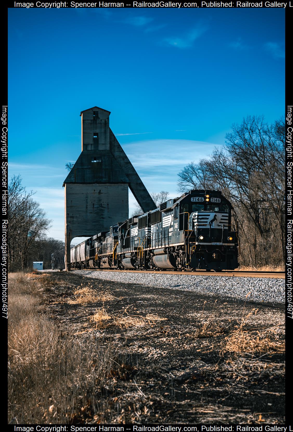 NS 7146 is a class EMD GP60 and  is pictured in Michigan City, Indiana, USA.  This was taken along the Michigan Line on the Amtrak. Photo Copyright: Spencer Harman uploaded to Railroad Gallery on 01/02/2025. This photograph of NS 7146 was taken on Monday, December 30, 2024. All Rights Reserved. 