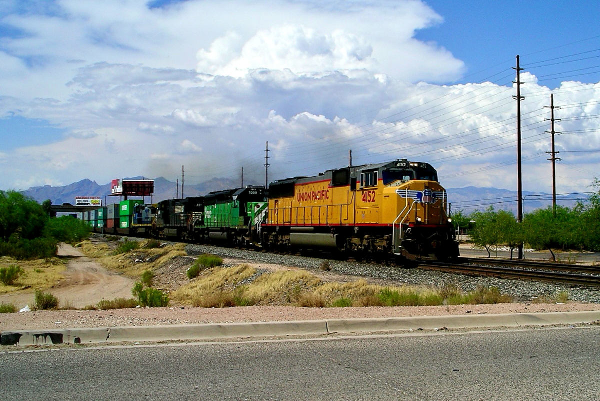 UP 4152 is a class EMD SD70M and  is pictured in Tucson, Arizona, USA.  This was taken along the Lordsburg/UP on the Union Pacific Railroad. Photo Copyright: Rick Doughty uploaded to Railroad Gallery on 01/11/2025. This photograph of UP 4152 was taken on Saturday, July 17, 2004. All Rights Reserved. 