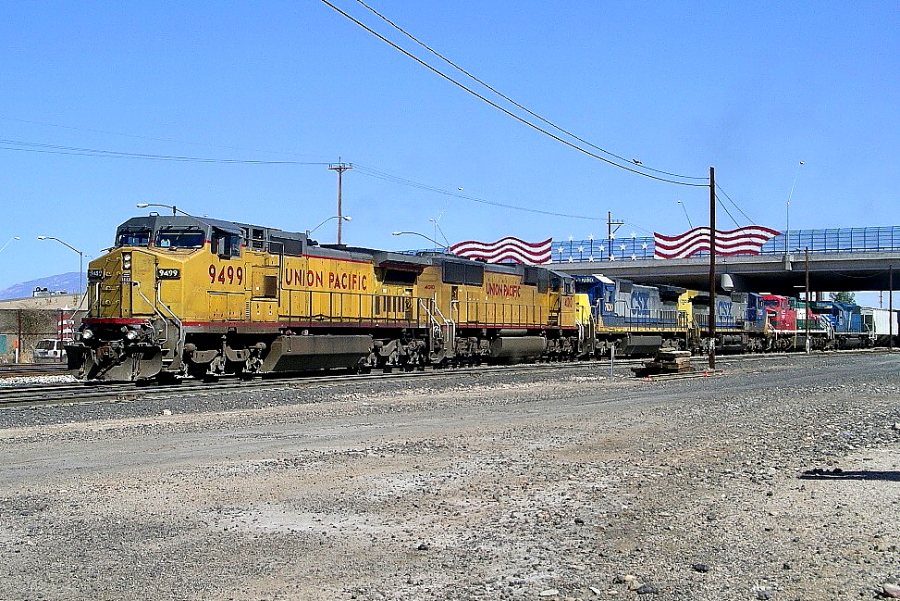 UP 9499 is a class GE C41-8W (Dash 8-41CW) and  is pictured in Tucson, Arizona, USA.  This was taken along the Lordsburg/UP on the Union Pacific Railroad. Photo Copyright: Rick Doughty uploaded to Railroad Gallery on 01/16/2025. This photograph of UP 9499 was taken on Wednesday, April 12, 2006. All Rights Reserved. 