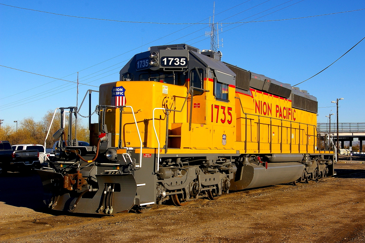 UP 1735 is a class EMD SD40-2 and  is pictured in Tucson, Arizona, USA.  This was taken along the Lordsburg/UP on the Union Pacific Railroad. Photo Copyright: Rick Doughty uploaded to Railroad Gallery on 01/31/2025. This photograph of UP 1735 was taken on Monday, March 11, 2013. All Rights Reserved. 