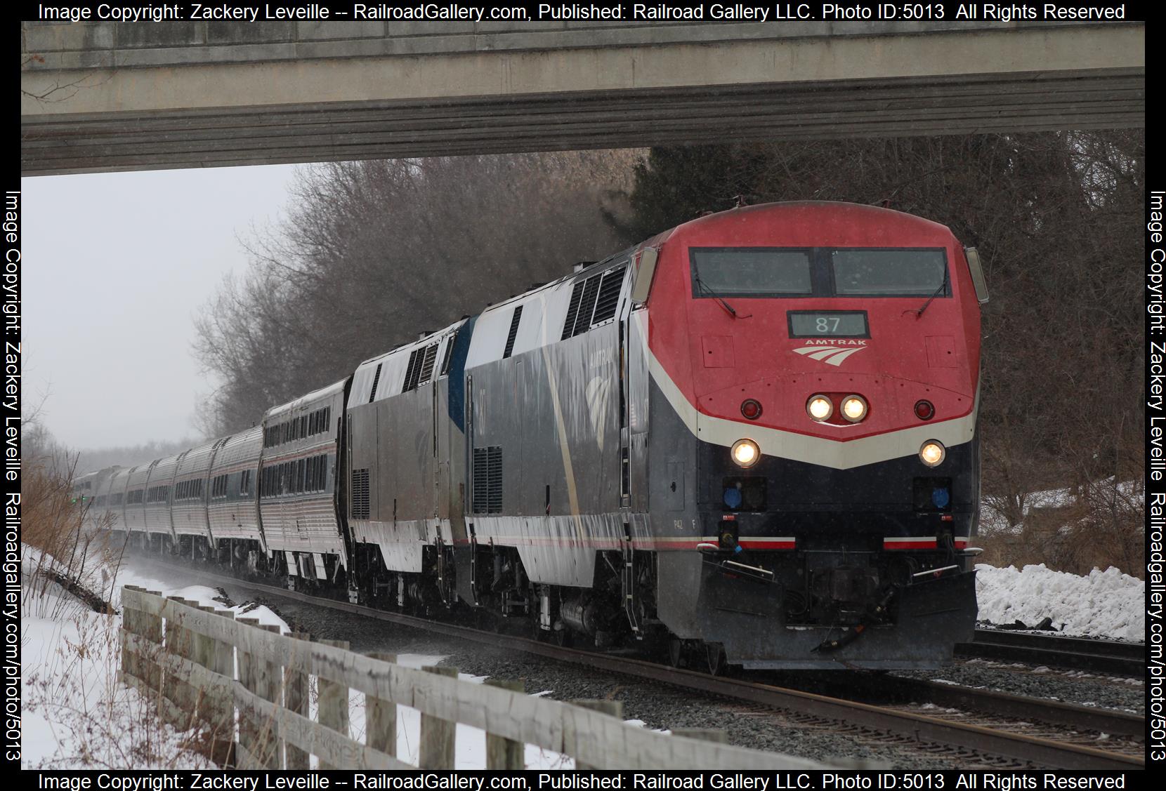 AMTK 87 is a class P42DC  and  is pictured in Fort Plain New York , New York, United States.  This was taken along the CSX Mohawk Subdivision on the CSX. Photo Copyright: Zackery Leveille uploaded to Railroad Gallery on 02/15/2025. This photograph of AMTK 87 was taken on Saturday, February 15, 2025. All Rights Reserved. 