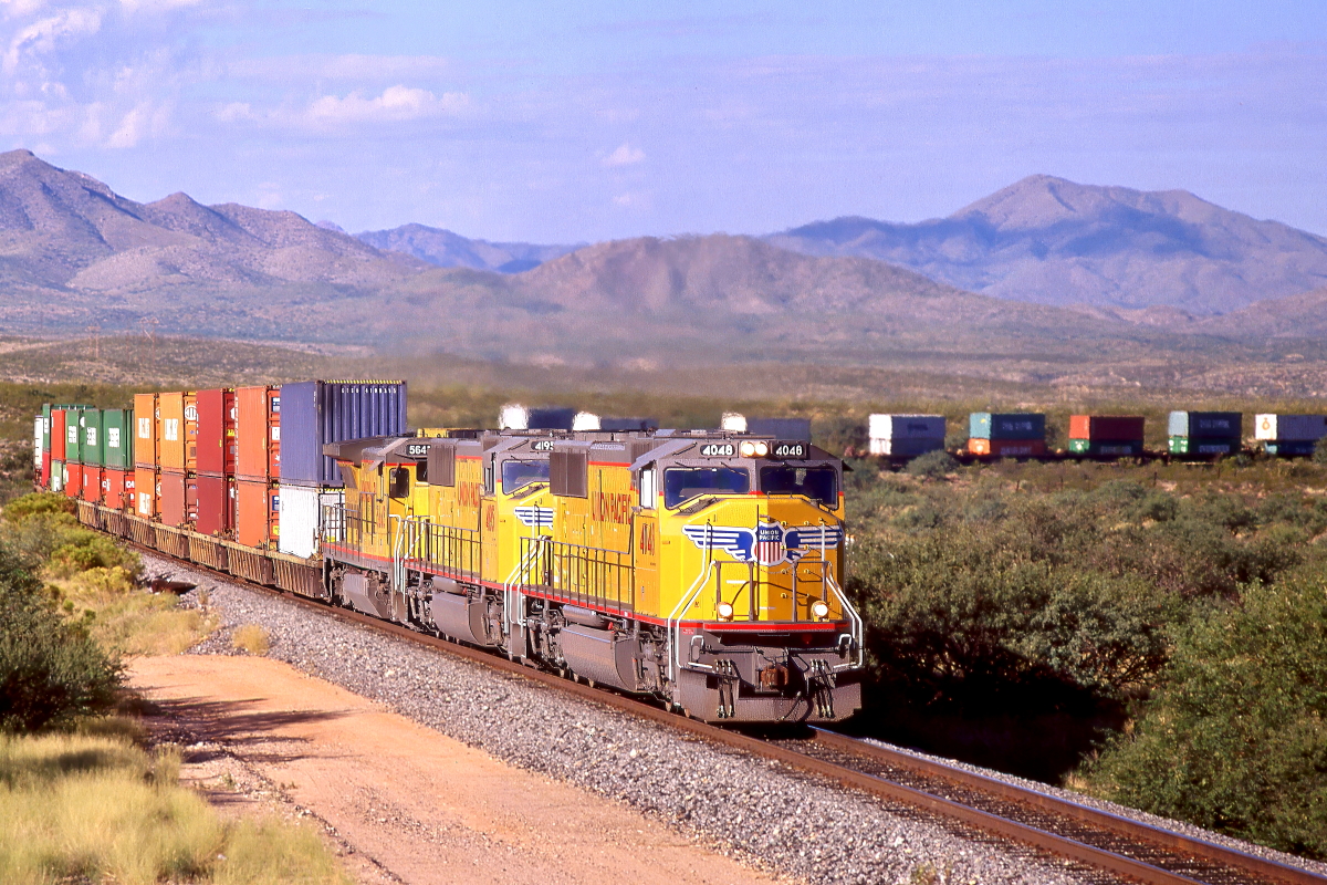 UP 4048 is a class EMD SD70M and  is pictured in Mescal, Arizona, USA.  This was taken along the Lordsburg/UP on the Union Pacific Railroad. Photo Copyright: Rick Doughty uploaded to Railroad Gallery on 02/18/2025. This photograph of UP 4048 was taken on Saturday, September 23, 2000. All Rights Reserved. 