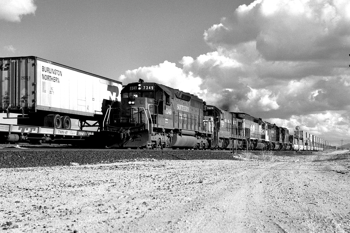 SP 7349 is a class EMD SD40 and  is pictured in Vail, Arizona, USA.  This was taken along the Lordsburg/SP on the Southern Pacific Transportation Company. Photo Copyright: Rick Doughty uploaded to Railroad Gallery on 02/24/2025. This photograph of SP 7349 was taken on Saturday, November 14, 1987. All Rights Reserved. 