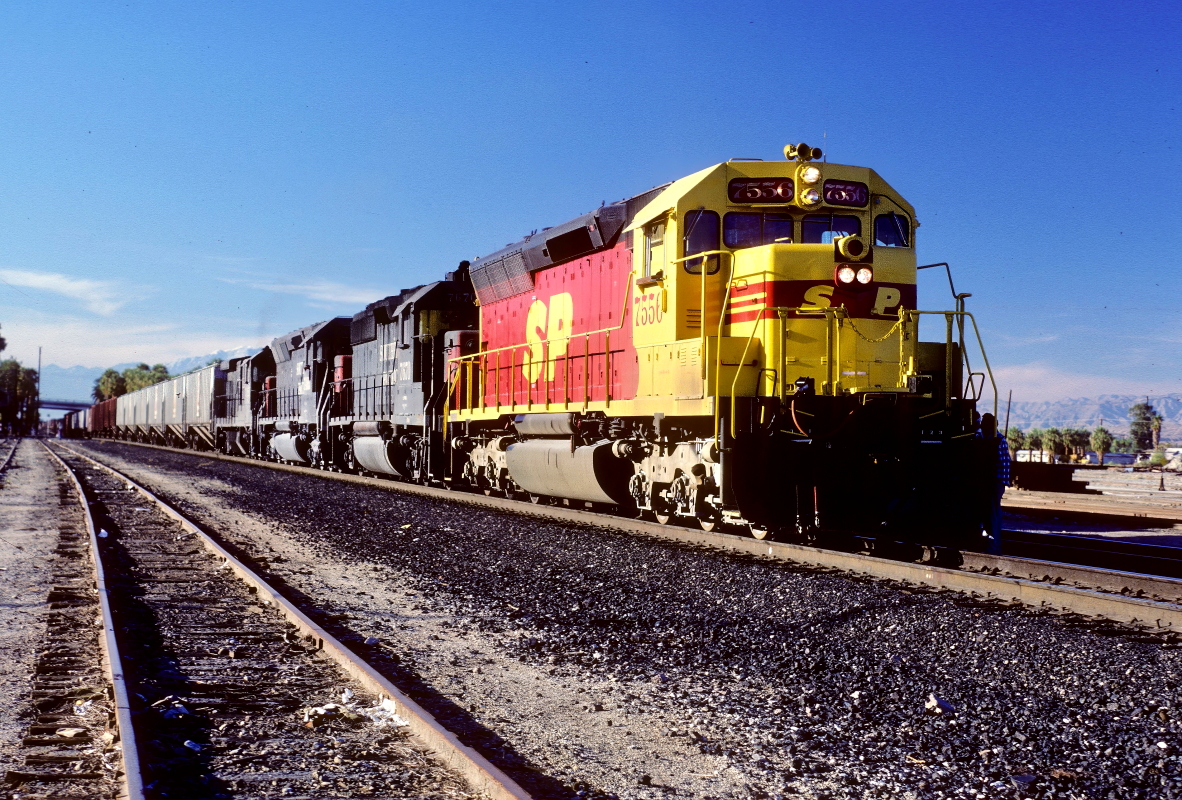 SP 7556 is a class EMD SD45 and  is pictured in Indio, California, USA.  This was taken along the Yuma/SP on the Southern Pacific Transportation Company. Photo Copyright: Rick Doughty uploaded to Railroad Gallery on 03/21/2025. This photograph of SP 7556 was taken on Friday, November 15, 1985. All Rights Reserved. 