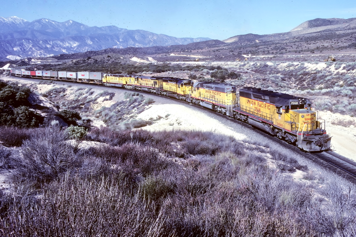 UP 3568 is a class EMD SD40-2 and  is pictured in Summit, California, USA.  This was taken along the Cajon/Santa Fe on the Union Pacific Railroad. Photo Copyright: Rick Doughty uploaded to Railroad Gallery on 03/21/2025. This photograph of UP 3568 was taken on Friday, February 24, 1984. All Rights Reserved. 