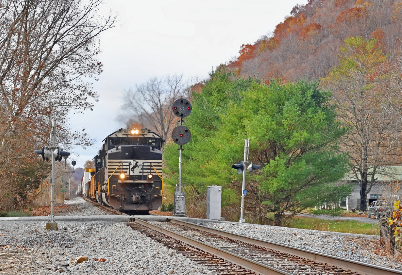 NS 1112 is a class EMD SD70ACe and  is pictured in Midvale, VA, United States.  This was taken along the NS Washington District  on the Norfolk Southern. Photo Copyright: Robby Lefkowitz uploaded to Railroad Gallery on 11/12/2022. This photograph of NS 1112 was taken on Sunday, October 30, 2022. All Rights Reserved. 