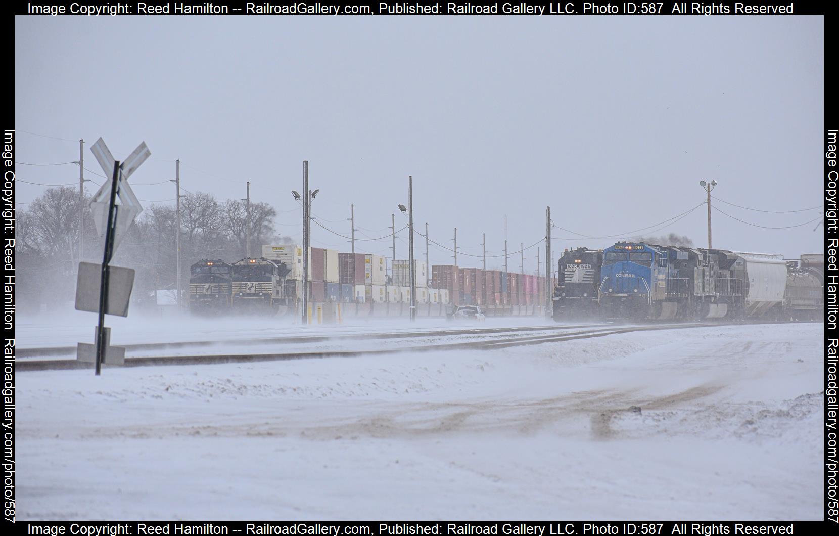 NS 8098, CP 7020, NS 1625, NS 1152, and NS  9578 is a class GE C44-9W (Dash 9-44CW), EMD SD70ACe, EMD SD40-2, GE ES44AC, and EMD SD70ACU and  is pictured in Elkhart, Indiana, United States.  This was taken along the NS Dearborn Division/Chicago Line on the Norfolk Southern. Photo Copyright: Reed Hamilton uploaded to Railroad Gallery on 01/17/2023. This photograph of NS 8098, CP 7020, NS 1625, NS 1152, and NS  9578 was taken on Saturday, February 19, 2022. All Rights Reserved. 