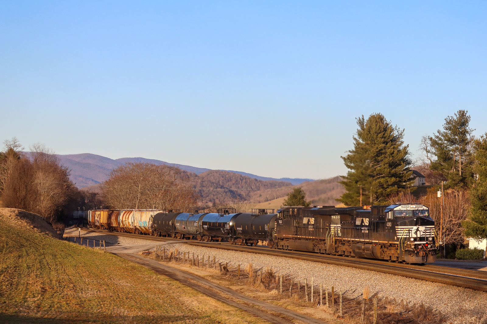 NS 4393 is a class GE AC44C6M and  is pictured in Shawsville , Virginia, United States.  This was taken along the NS Christiansburg District  on the Norfolk Southern Railway. Photo Copyright: Robby Lefkowitz uploaded to Railroad Gallery on 01/25/2023. This photograph of NS 4393 was taken on Saturday, January 21, 2023. All Rights Reserved. 