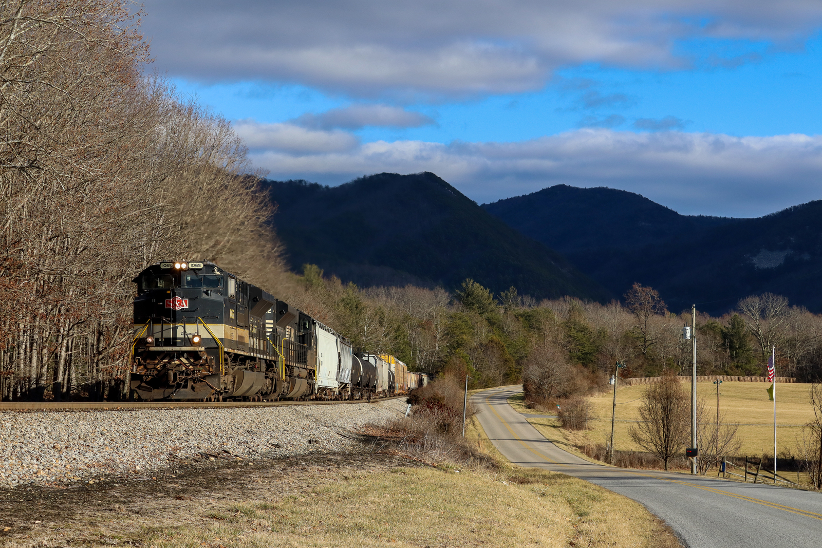 NS 1065 is a class EMD SD70ACe and  is pictured in Raphine, Virginia, USA.  This was taken along the NS Hagerstown District/line on the Norfolk Southern Railway. Photo Copyright: Robby Lefkowitz uploaded to Railroad Gallery on 01/25/2023. This photograph of NS 1065 was taken on Friday, January 20, 2023. All Rights Reserved. 