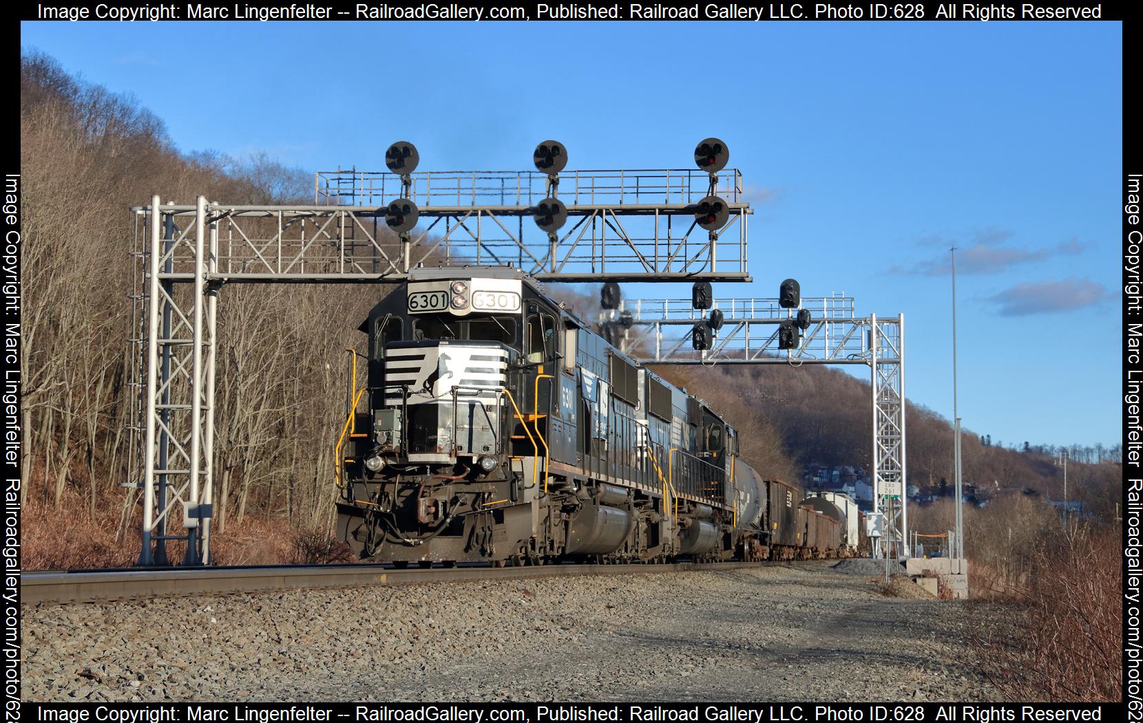 NS 6301 is a class EMD SD40E and  is pictured in South Fork, Pennsylvania, USA.  This was taken along the NS Pittsburgh Line on the Norfolk Southern. Photo Copyright: Marc Lingenfelter uploaded to Railroad Gallery on 01/26/2023. This photograph of NS 6301 was taken on Saturday, March 03, 2018. All Rights Reserved. 