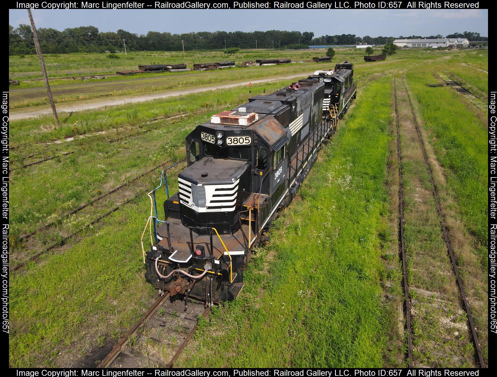 NS 3805 is a class EMD SD38-2 and  is pictured in Silvis, Illinois, USA.  This was taken along the Silvis NRE Shops on the Norfolk Southern. Photo Copyright: Marc Lingenfelter uploaded to Railroad Gallery on 01/31/2023. This photograph of NS 3805 was taken on Monday, August 02, 2021. All Rights Reserved. 