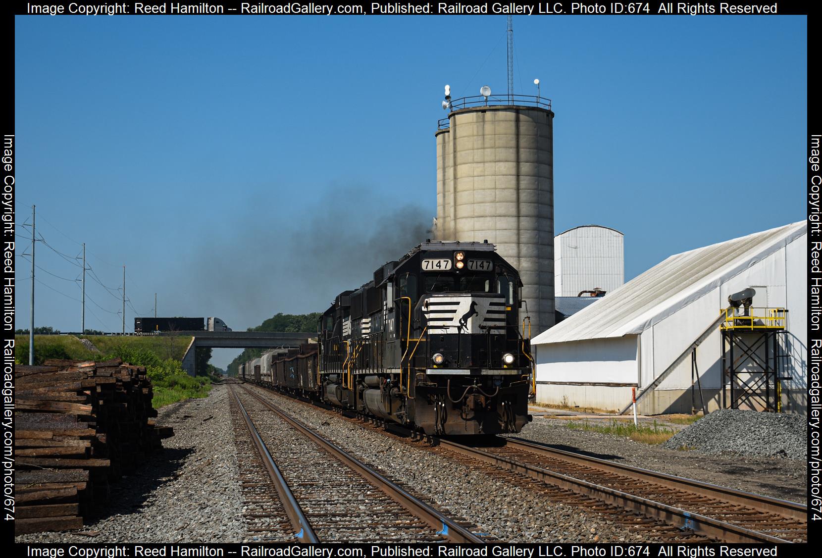 NS 7147 is a class EMD GP60 and  is pictured in Rolling Prairie, IN, United States.  This was taken along the Dearborn Division/Chicago Line on the Norfolk Southern. Photo Copyright: Reed Hamilton uploaded to Railroad Gallery on 02/07/2023. This photograph of NS 7147 was taken on Monday, July 18, 2022. All Rights Reserved. 