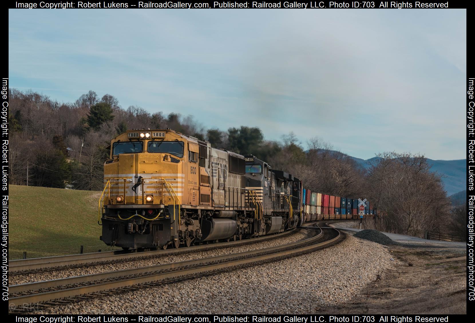 NS 279 NS 1800 is a class SD70ACC and  is pictured in Shawsville, VA, United States.  This was taken along the NS Christiansburg District on the Norfolk Southern. Photo Copyright: Robert Lukens uploaded to Railroad Gallery on 02/17/2023. This photograph of NS 279 NS 1800 was taken on Saturday, February 11, 2023. All Rights Reserved. 
