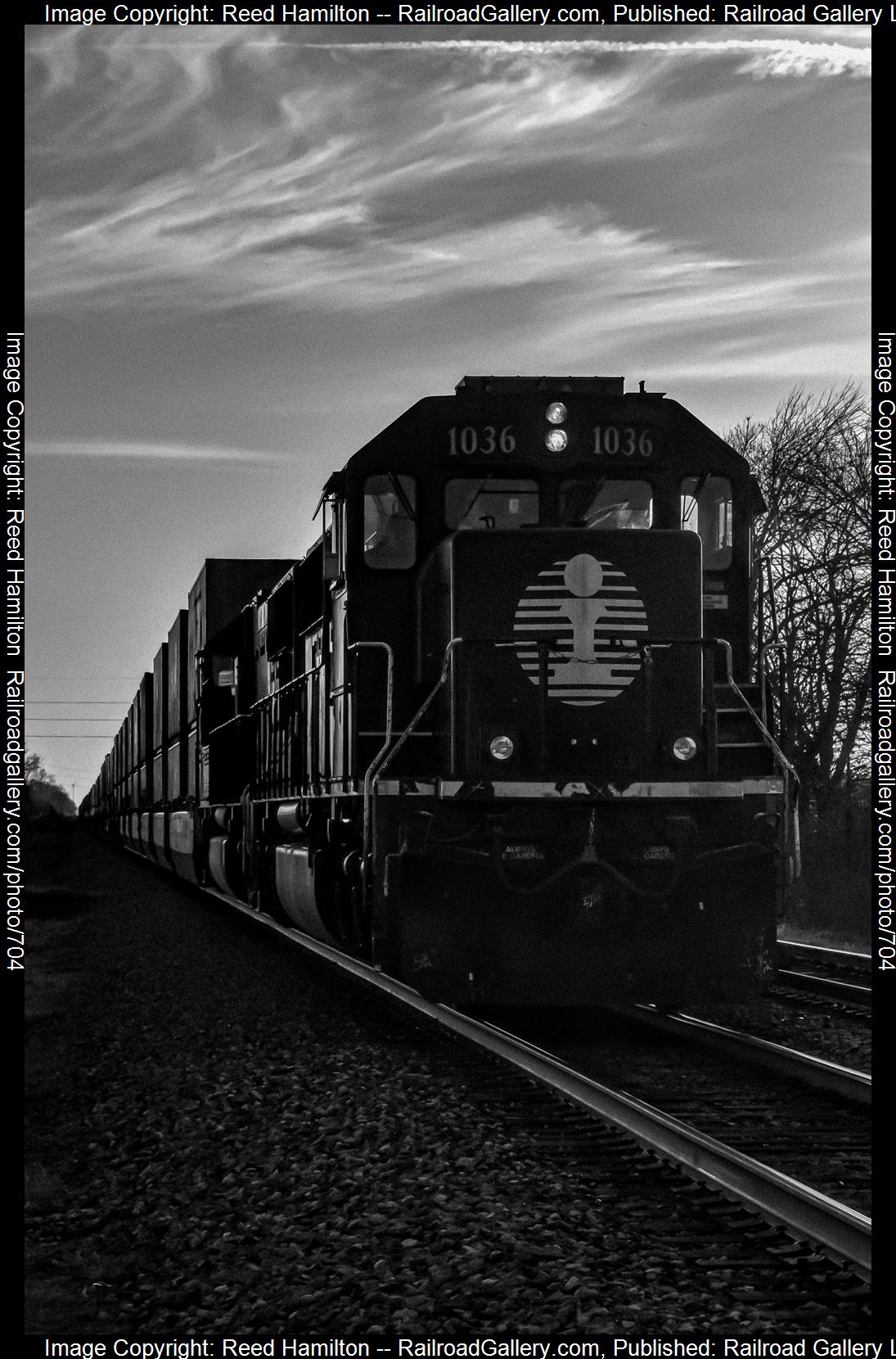 IC 1036 is a class EMD SD70 and  is pictured in South Bend, IN, United States.  This was taken along the South Bend Sub on the Illinois Central Railroad. Photo Copyright: Reed Hamilton uploaded to Railroad Gallery on 02/18/2023. This photograph of IC 1036 was taken on Sunday, March 13, 2022. All Rights Reserved. 