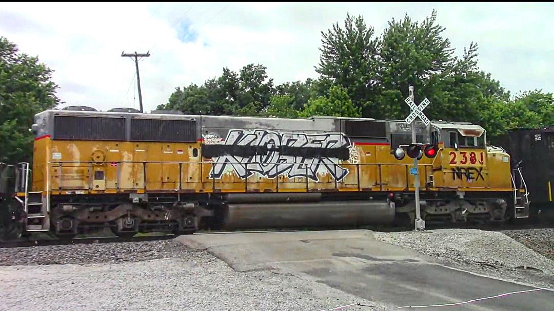 NREX 2381 is a class EMD SD60M and  is pictured in Woodlawn, Illinois, USA.  This was taken along the BNSF Beardstown subdivision on the National Railway Equipment. Photo Copyright: Blaise Lambert uploaded to Railroad Gallery on 03/10/2023. This photograph of NREX 2381 was taken on Tuesday, June 07, 2022. All Rights Reserved. 