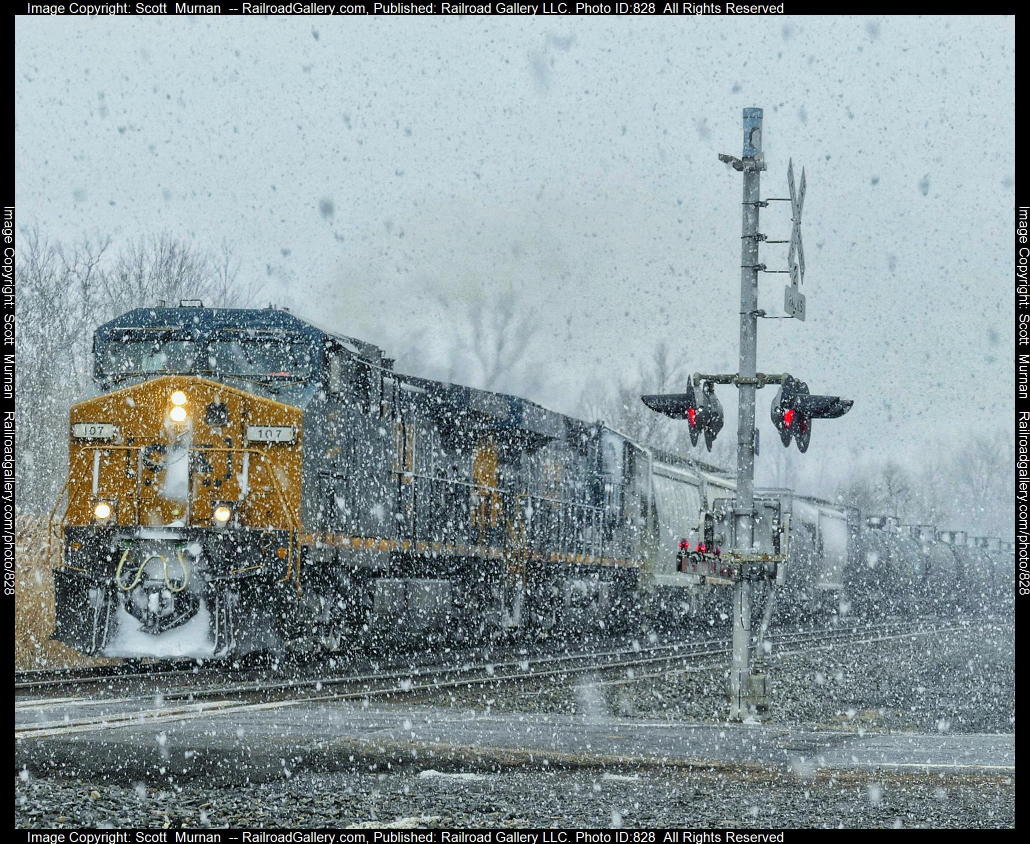 CSX 107 is a class GE AC4400CW and  is pictured in Macedon, New York, United States.  This was taken along the Rochester Subdivision  on the CSX Transportation. Photo Copyright: Scott  Murnan  uploaded to Railroad Gallery on 03/11/2023. This photograph of CSX 107 was taken on Friday, March 10, 2023. All Rights Reserved. 