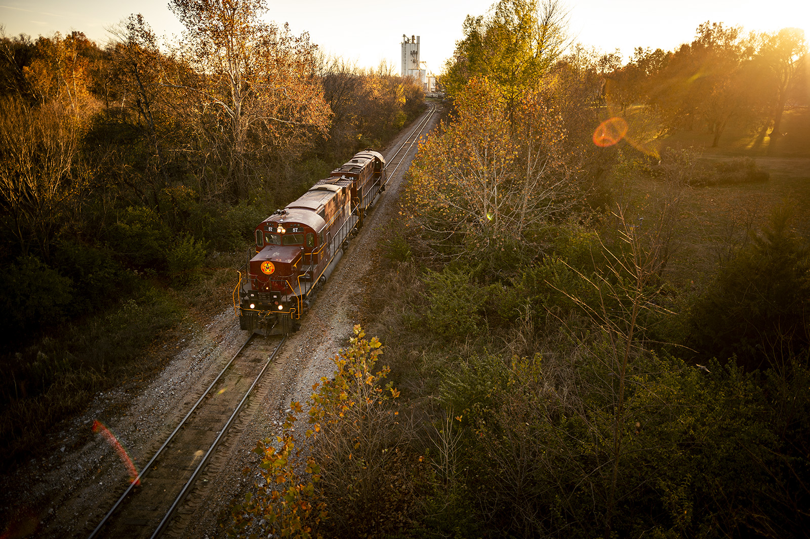 AM 57 is a class Alco C420 and  is pictured in Springdale, Arkansas, USA.  This was taken along the Mainline on the Arkansas and Missouri Railroad. Photo Copyright: Hunter Williams uploaded to Railroad Gallery on 11/13/2022. This photograph of AM 57 was taken on Saturday, November 12, 2022. All Rights Reserved. 