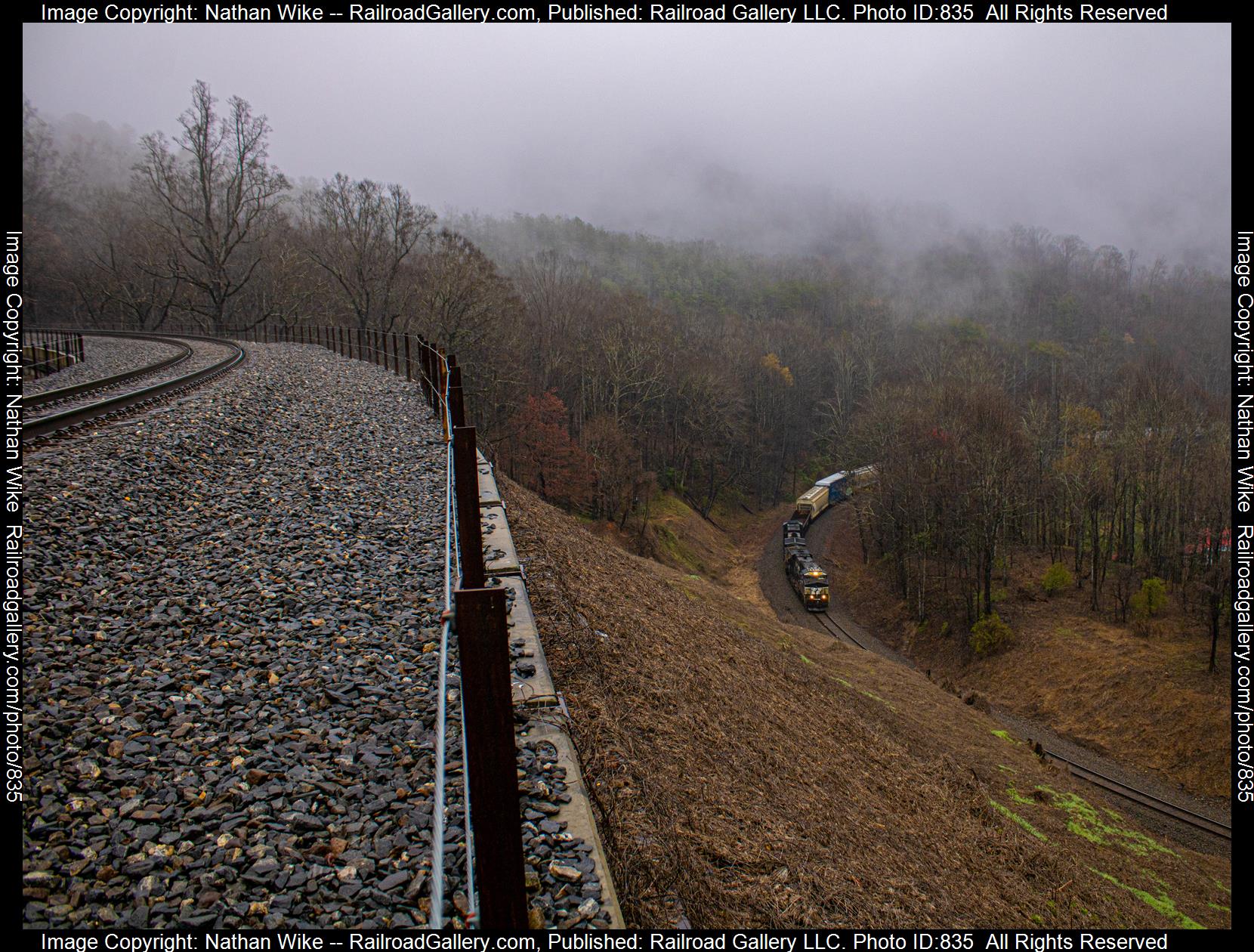 NS 8037 is a class ES44AC and  is pictured in Old Fort, North Carolina, United States.  This was taken along the Asheville District  on the Norfolk Southern. Photo Copyright: Nathan Wike uploaded to Railroad Gallery on 03/12/2023. This photograph of NS 8037 was taken on Sunday, March 12, 2023. All Rights Reserved. 