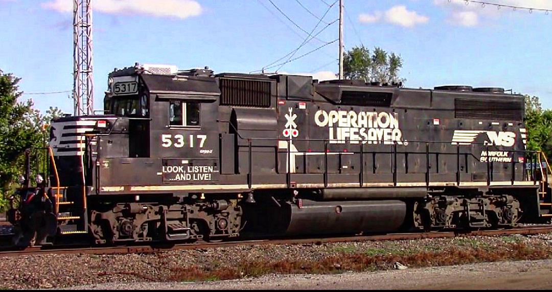 NS 5317 is a class EMD GP38-2 and  is pictured in Centralia, Illinois, USA.  This was taken along the NS Southern West district on the Norfolk Southern. Photo Copyright: Blaise Lambert uploaded to Railroad Gallery on 03/13/2023. This photograph of NS 5317 was taken on Friday, October 08, 2021. All Rights Reserved. 