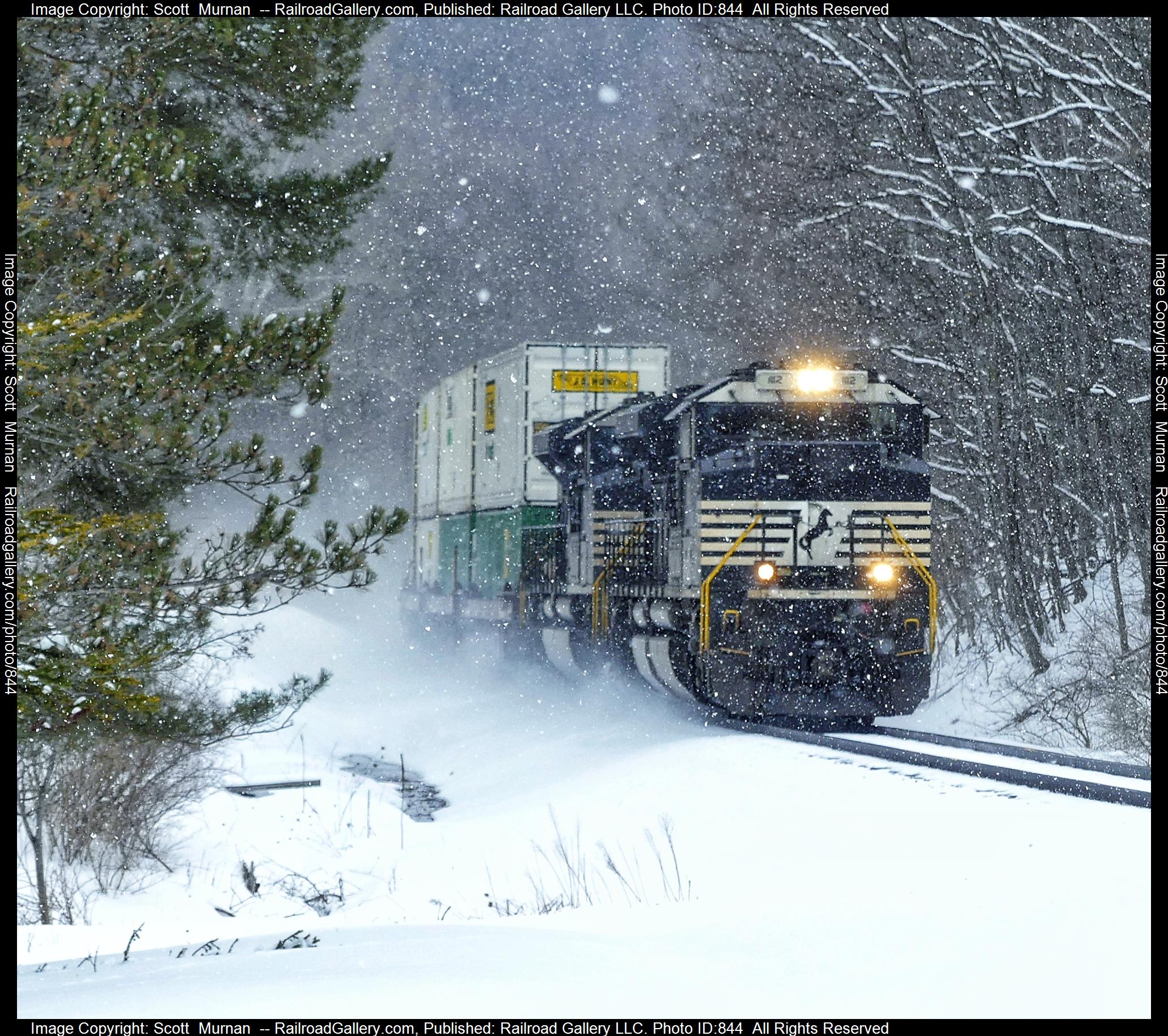 NS 1112 is a class EMD SD70ACe and  is pictured in Dale , New York, United States.  This was taken along the Southern Tier Line on the Norfolk Southern. Photo Copyright: Scott  Murnan  uploaded to Railroad Gallery on 03/13/2023. This photograph of NS 1112 was taken on Monday, March 13, 2023. All Rights Reserved. 