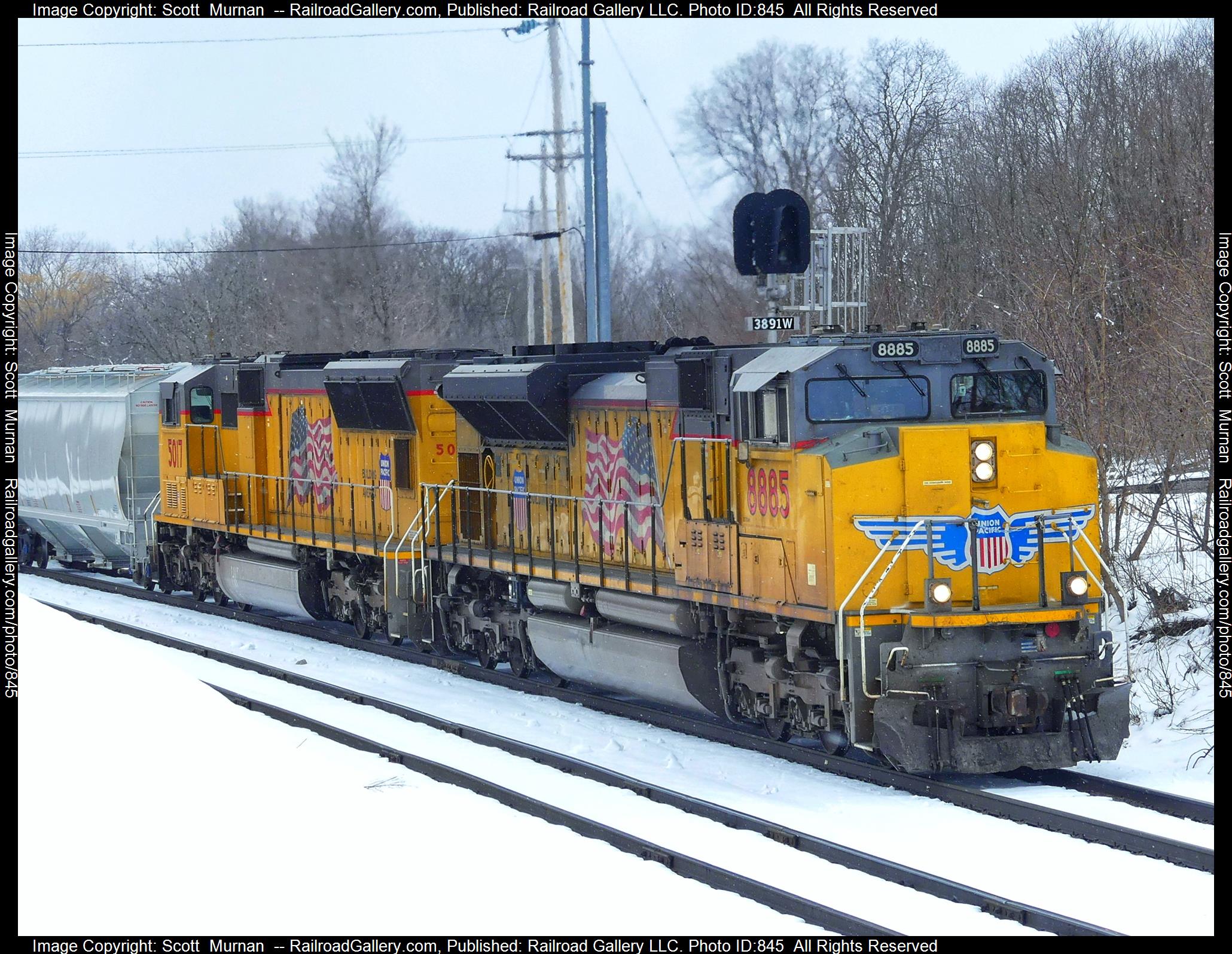 UP 8885 is a class EMD SD70ACe and  is pictured in Attica, New York, United States.  This was taken along the Southern Tier Line on the Norfolk Southern. Photo Copyright: Scott  Murnan  uploaded to Railroad Gallery on 03/15/2023. This photograph of UP 8885 was taken on Monday, March 13, 2023. All Rights Reserved. 