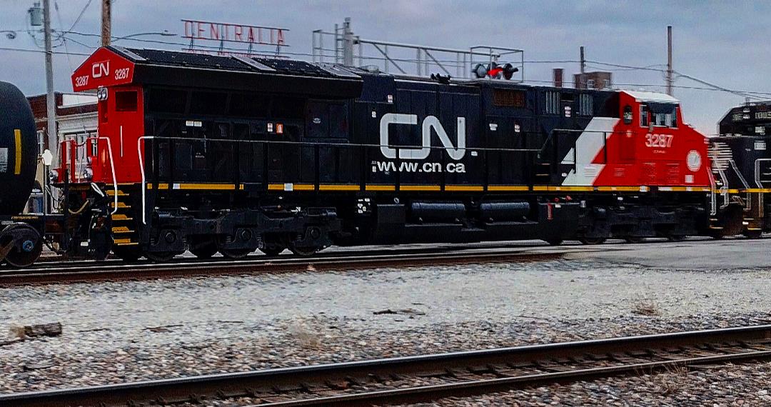 CN 3287 is a class GE ET44AC and  is pictured in Centralia, Illinois, USA.  This was taken along the CN Centralia subdivision on the Canadian National Railway. Photo Copyright: Blaise Lambert uploaded to Railroad Gallery on 03/19/2023. This photograph of CN 3287 was taken on Saturday, March 18, 2023. All Rights Reserved. 