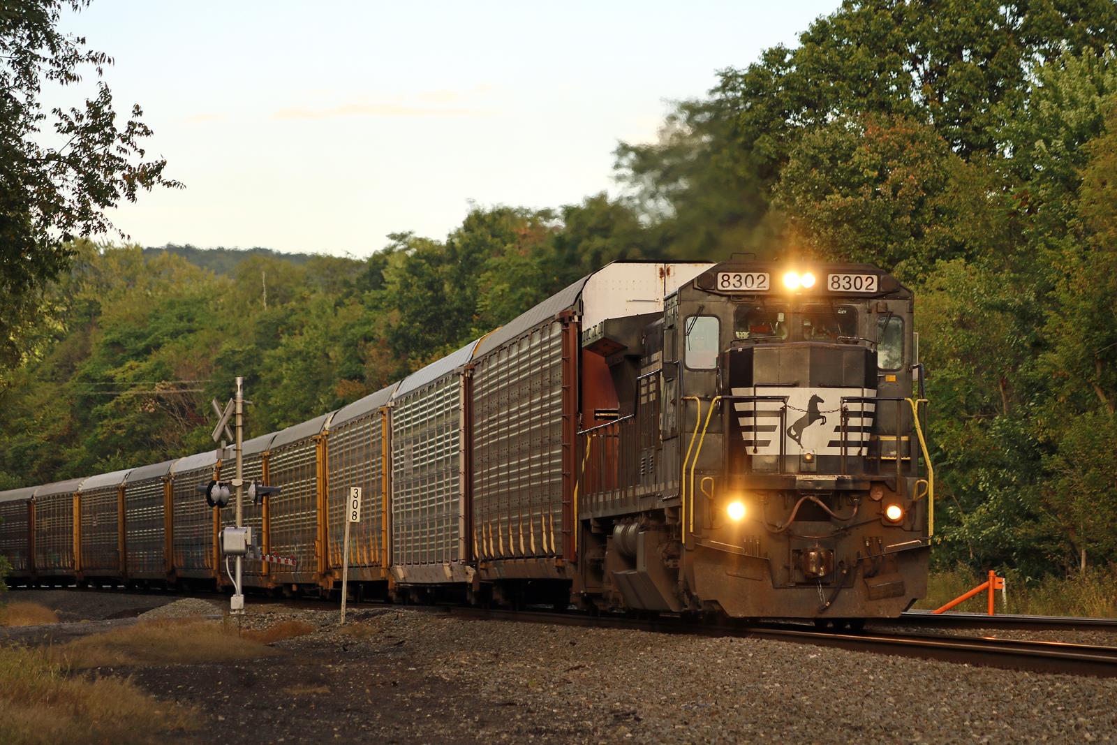 NS 8302 is a class GE C40-8 (Dash 8-40C) and  is pictured in Derry, Pennsylvania, United States.  This was taken along the Pittsburgh Line on the Norfolk Southern. Photo Copyright: Adam Klimchock uploaded to Railroad Gallery on 11/13/2022. This photograph of NS 8302 was taken on Saturday, October 01, 2016. All Rights Reserved. 