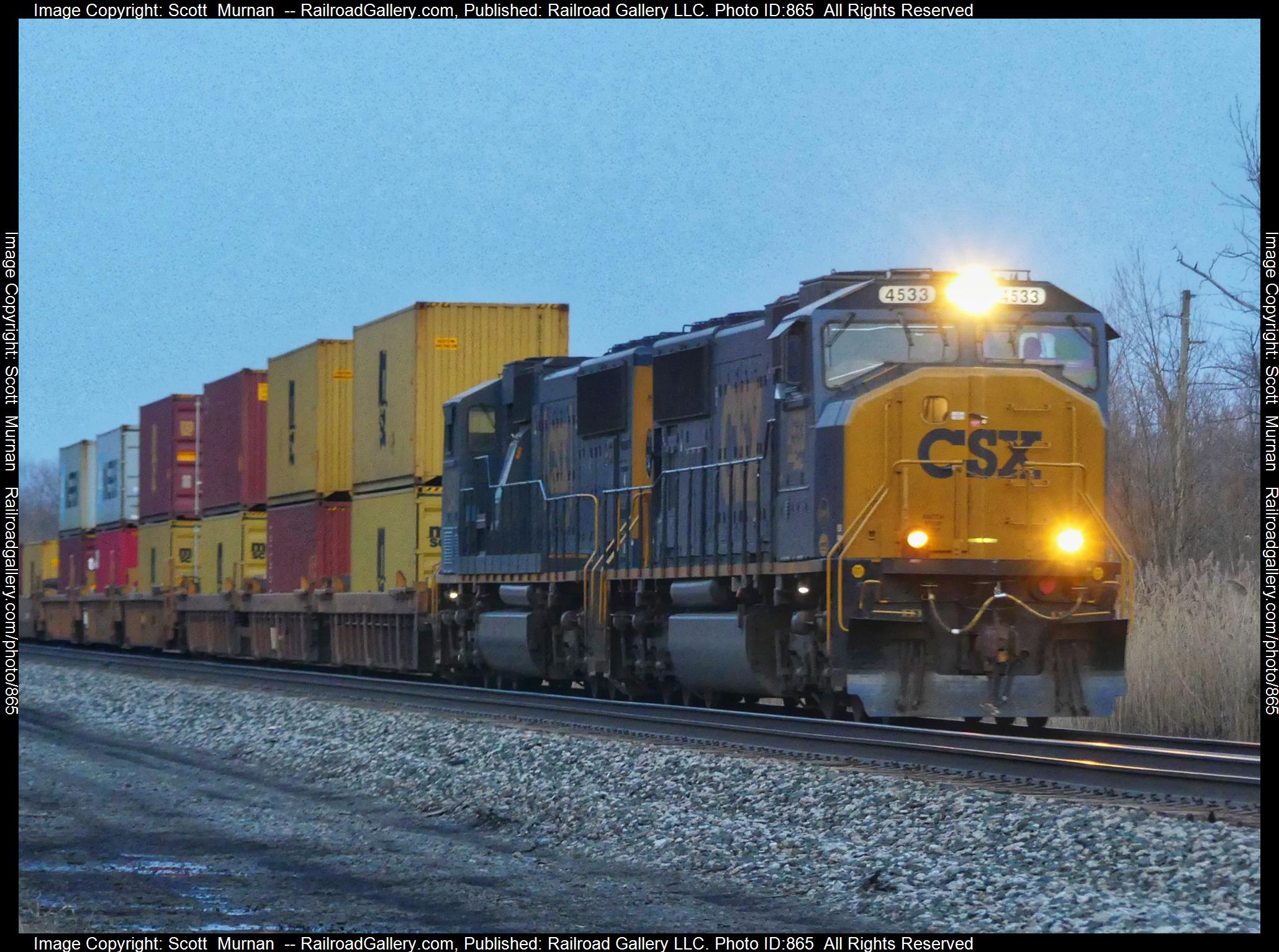 CSX 4533 is a class EMD SD70MAC and  is pictured in Macedon, New York, United States.  This was taken along the Rochester Subdivision  on the CSX Transportation. Photo Copyright: Scott  Murnan  uploaded to Railroad Gallery on 03/21/2023. This photograph of CSX 4533 was taken on Tuesday, March 21, 2023. All Rights Reserved. 