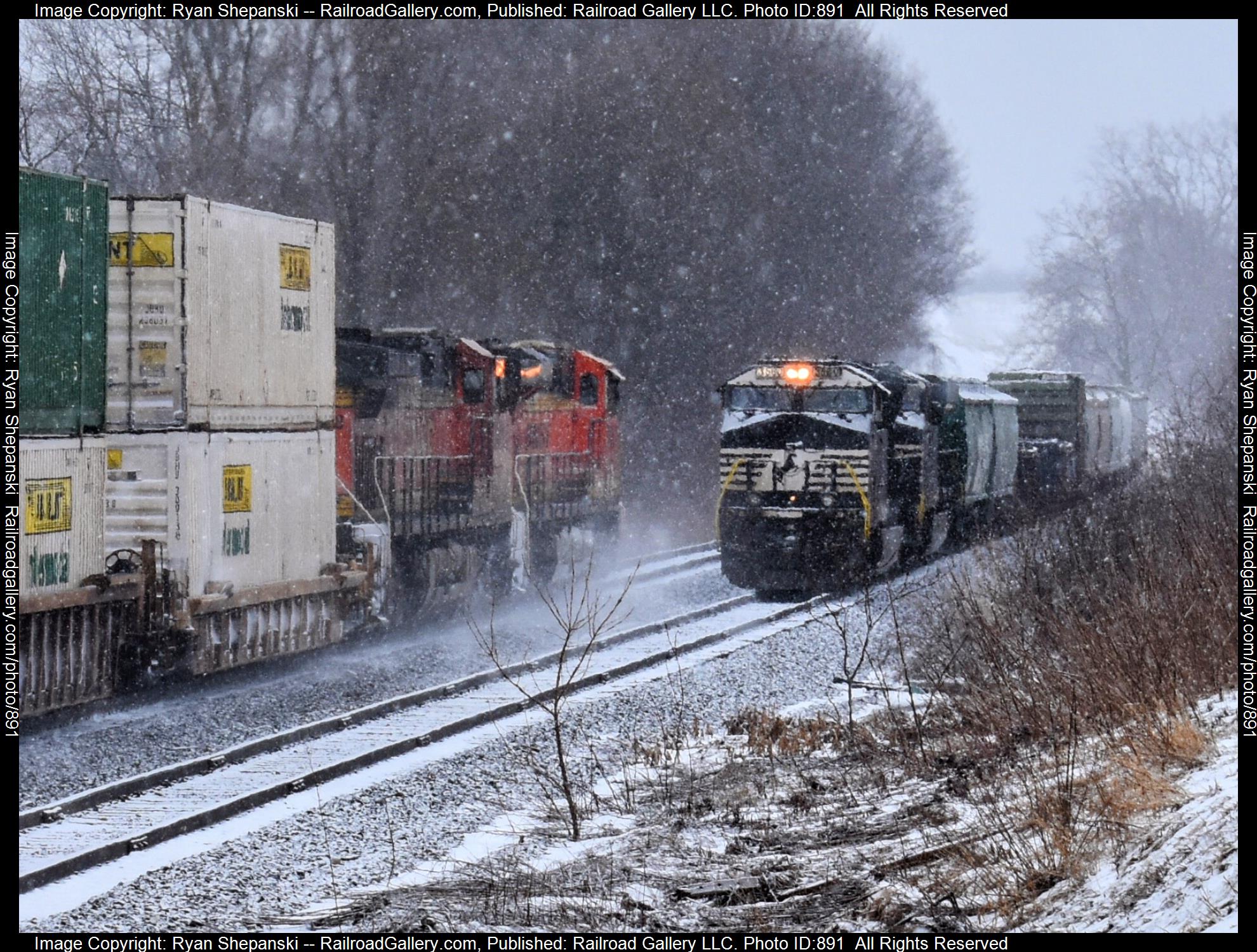 BNSF 7486 NS 3680 is a class ES44DC ES44AC and  is pictured in Alexander , NY, United States.  This was taken along the Southern tier on the Norfolk Southern BNSF. Photo Copyright: Ryan Shepanski uploaded to Railroad Gallery on 03/27/2023. This photograph of BNSF 7486 NS 3680 was taken on Monday, January 30, 2023. All Rights Reserved. 