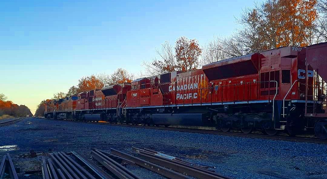 CP 7047 is a class EMD SD70ACU and  is pictured in Woodlawn, Illinois, USA.  This was taken along the BNSF Beardstown subdivision on the Canadian Pacific Railway. Photo Copyright: Blaise Lambert uploaded to Railroad Gallery on 04/04/2023. This photograph of CP 7047 was taken on Thursday, November 18, 2021. All Rights Reserved. 