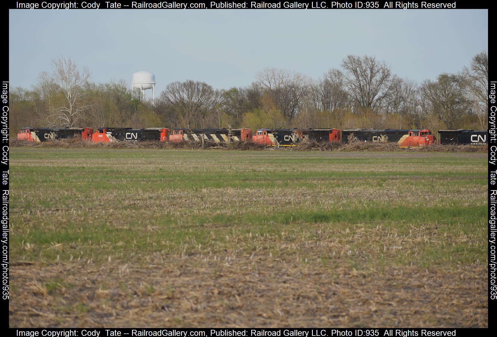 CN 2443 is a class C40-8M and  is pictured in Centralia, Illinois, USA.  This was taken along the Centralia subdivision  on the Canadian National Railway. Photo Copyright: Cody  Tate uploaded to Railroad Gallery on 04/08/2023. This photograph of CN 2443 was taken on Friday, April 07, 2023. All Rights Reserved. 