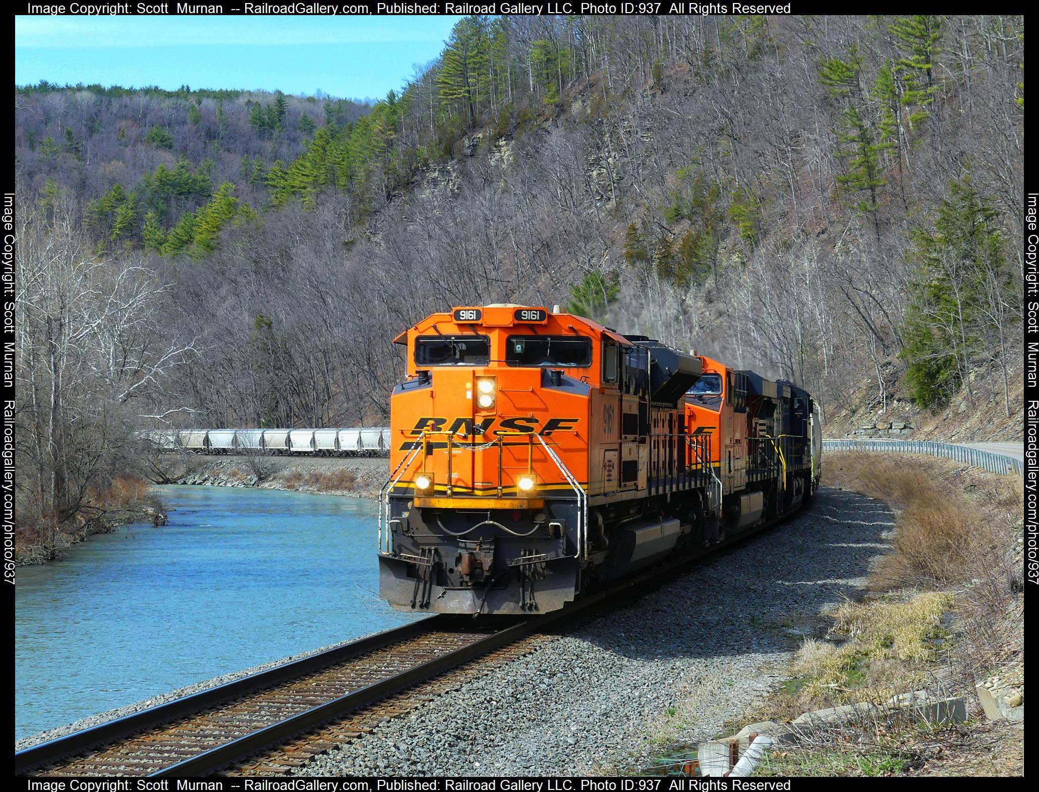BNSF 9161 is a class EMD SD70ACe and  is pictured in Rathbone, New York, United States.  This was taken along the Southern Tier Line on the Norfolk Southern. Photo Copyright: Scott  Murnan  uploaded to Railroad Gallery on 04/09/2023. This photograph of BNSF 9161 was taken on Saturday, April 08, 2023. All Rights Reserved. 