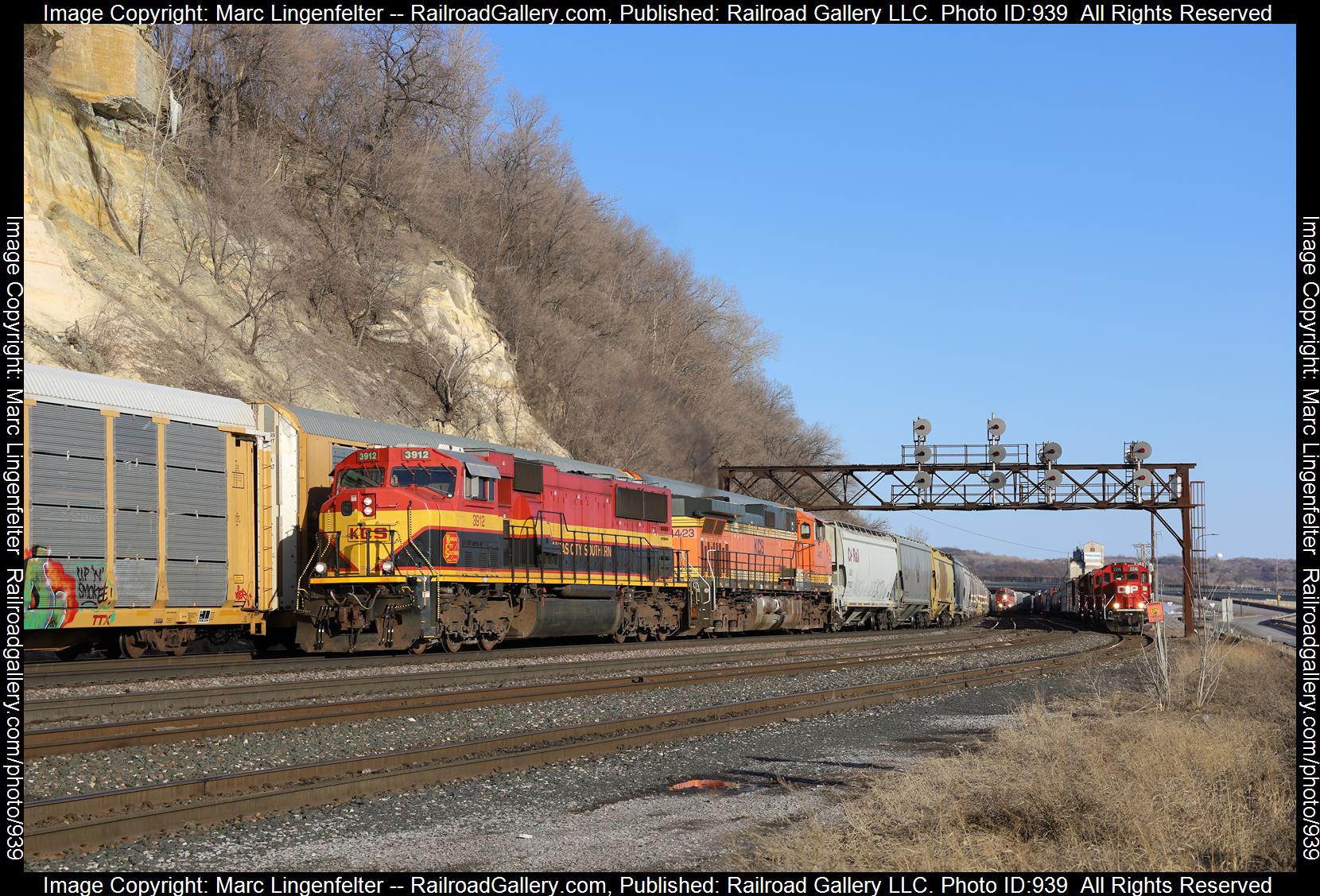 KCS 3912 is a class EMD SD70MAC and  is pictured in St Paul, Minnesota, USA.  This was taken along the BNSF St Paul Sub on the Kansas City Southern Railway. Photo Copyright: Marc Lingenfelter uploaded to Railroad Gallery on 04/09/2023. This photograph of KCS 3912 was taken on Monday, March 20, 2023. All Rights Reserved. 