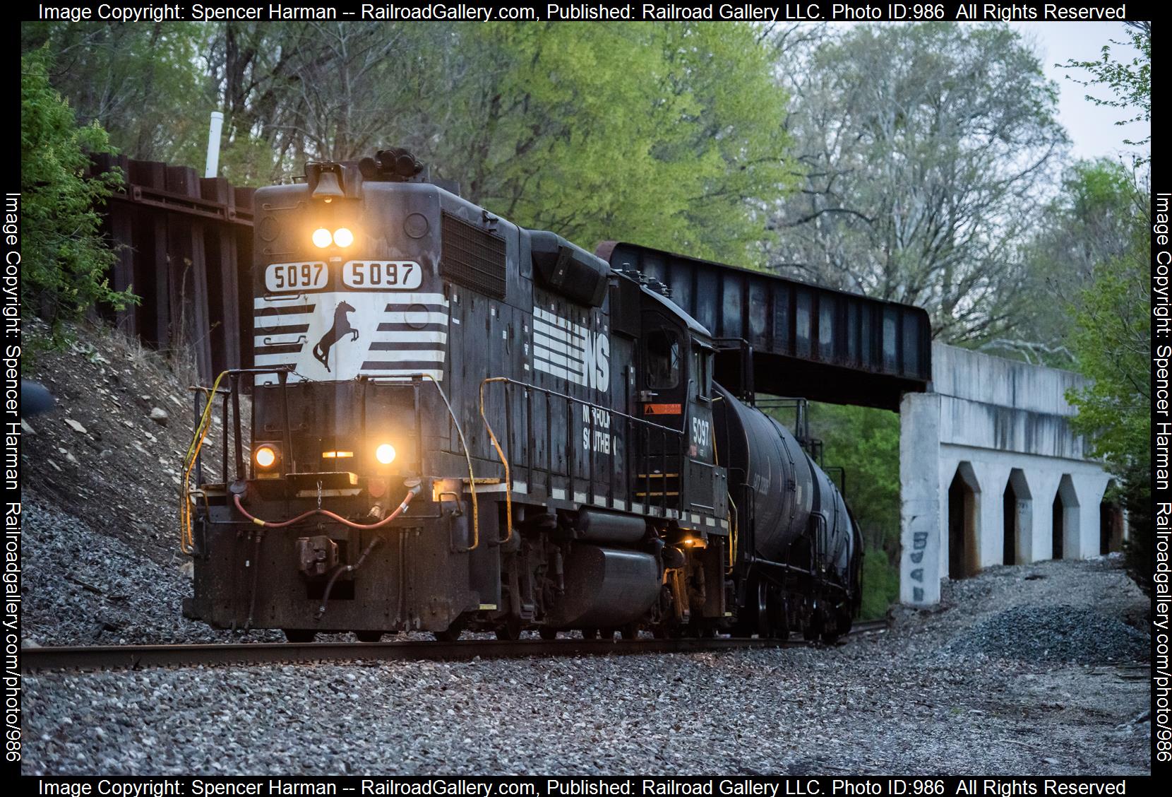 NS 5097 is a class EMD GP38-2 and  is pictured in Wabash, Indiana, USA.  This was taken along the Marion Branch on the Norfolk Southern. Photo Copyright: Spencer Harman uploaded to Railroad Gallery on 04/22/2023. This photograph of NS 5097 was taken on Friday, April 21, 2023. All Rights Reserved. 