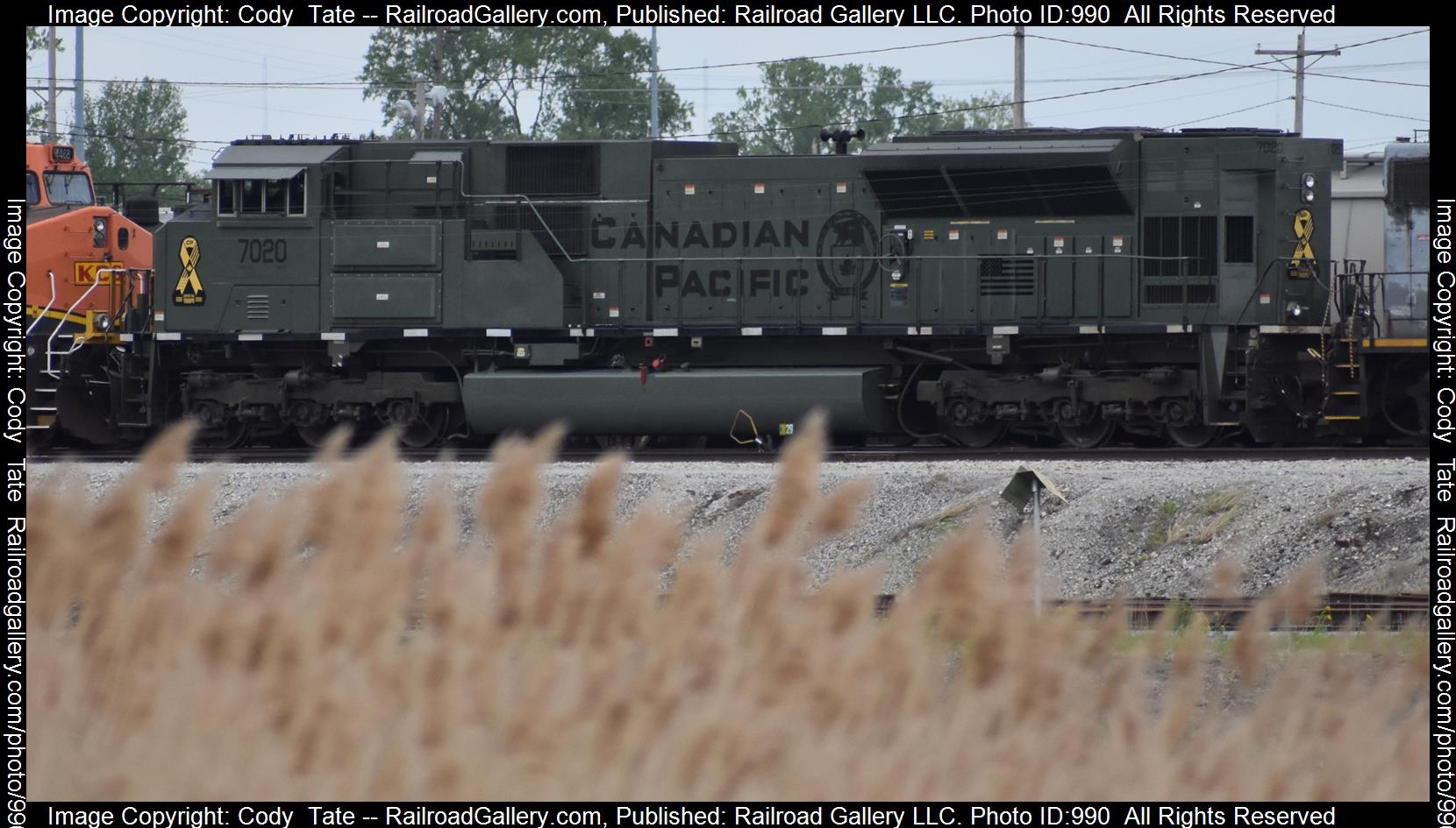 CP 7020 is a class SD70ACU and  is pictured in East Saint Louis , Illinois, USA.  This was taken along the East Saint Louis terminal division  on the Canadian Pacific Railway. Photo Copyright: Cody  Tate uploaded to Railroad Gallery on 04/22/2023. This photograph of CP 7020 was taken on Saturday, April 22, 2023. All Rights Reserved. 