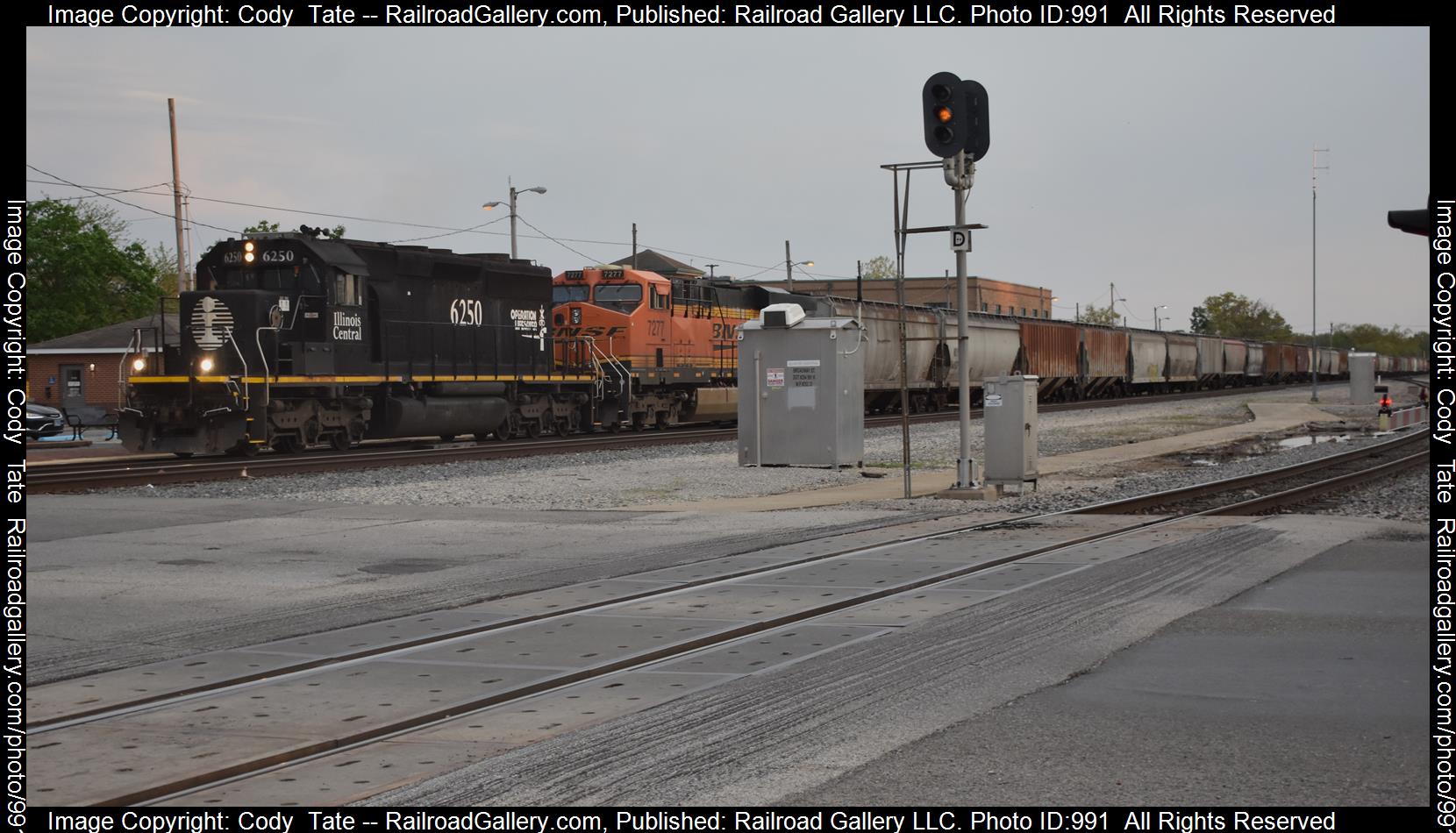 IC 6250 is a class SD40-3 and  is pictured in Centralia, Illinois, USA.  This was taken along the Centralia subdivision  on the Canadian National Railway. Photo Copyright: Cody  Tate uploaded to Railroad Gallery on 04/23/2023. This photograph of IC 6250 was taken on Friday, April 21, 2023. All Rights Reserved. 