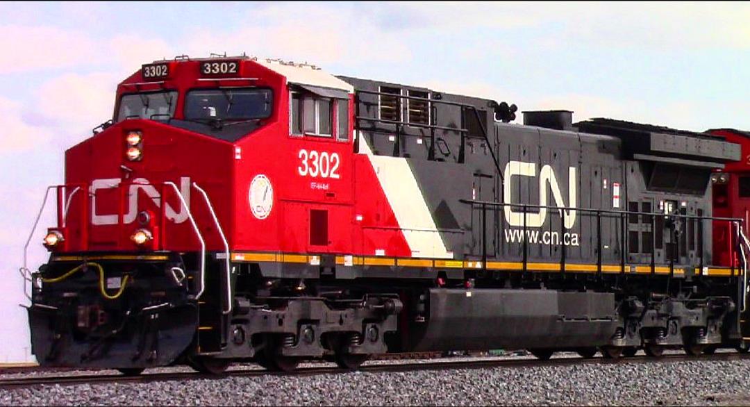 CN 3302 is a class GE AC44C6M and  is pictured in Irvington, Illinois, USA.  This was taken along the CN Centralia subdivision on the Canadian National Railway. Photo Copyright: Blaise Lambert uploaded to Railroad Gallery on 04/24/2023. This photograph of CN 3302 was taken on Sunday, April 23, 2023. All Rights Reserved. 