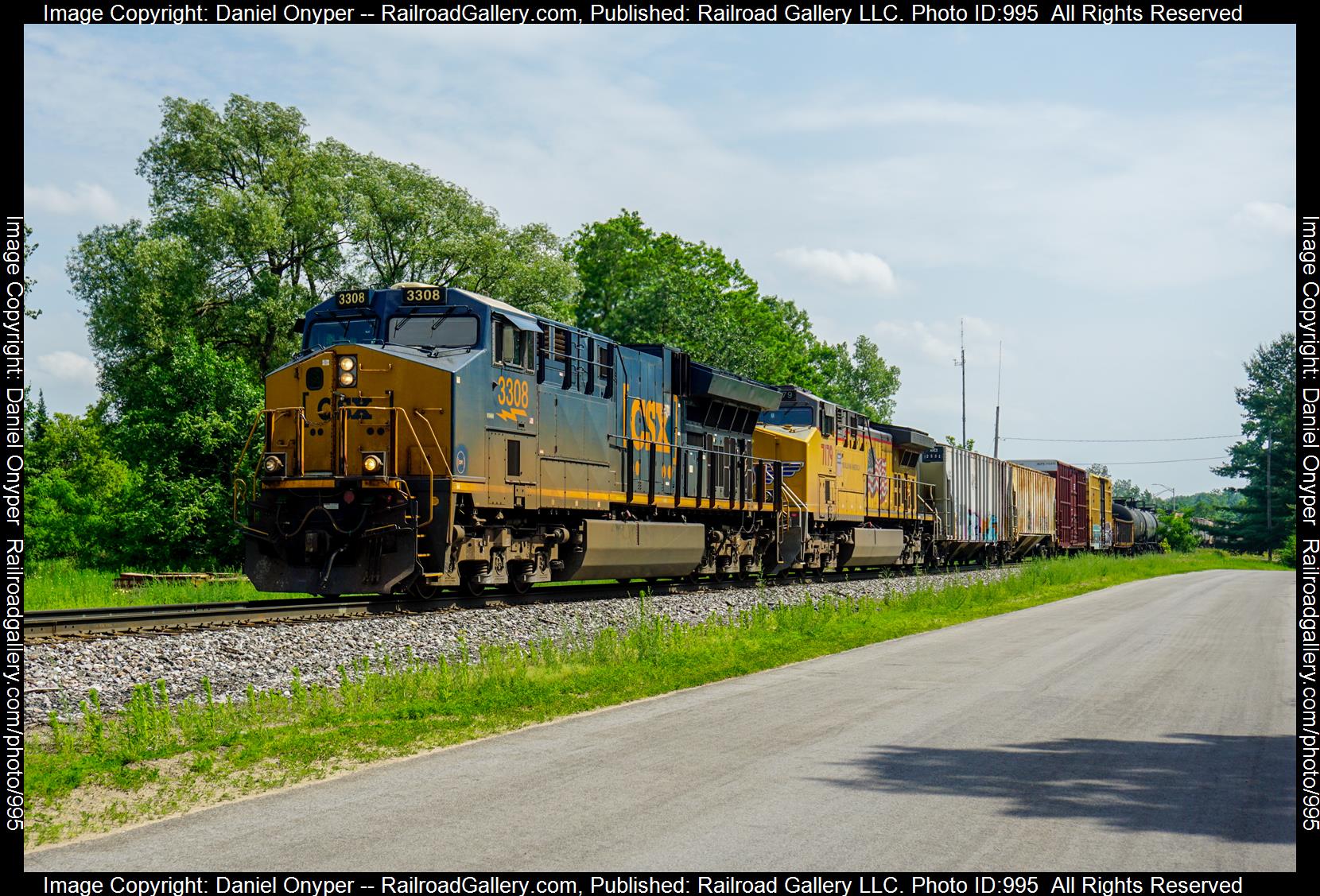 CSXT 3308 is a class GE ET44AH and  is pictured in Potsdam, New York, United States of America.  This was taken along the St. Lawrence Subdivision on the CSX Transportation. Photo Copyright: Daniel Onyper uploaded to Railroad Gallery on 04/24/2023. This photograph of CSXT 3308 was taken on Thursday, June 16, 2022. All Rights Reserved. 